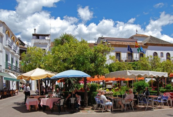 Relax and enjoy a drink from one of the pavement cafes in Orange Square (Plaza de los Naranjos)