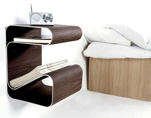 wooden-shape-bedside-table-with-shelfs-books-and-magazines-radio-wacker-also-beadboard-white-pillows