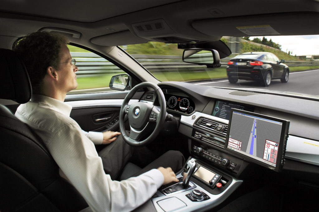 Research project Highly automated driving on highways - Dr. Nico Kämpchen on a test drive (08/2011)