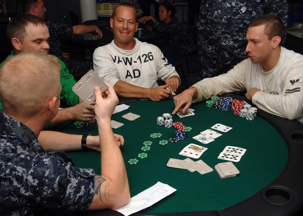 090620-N-2798F-033 ATLANTIC OCEAN (June 20, 2009) Sailors assigned to the aircraft carrier USS Harry S. Truman (CVN 75) and Carrier Air Wing (CVW) 3 compete in a Texas Hold 'Em Poker tournament aboard Harry S. Truman. The tournament is sponsored by the Harry S. Truman Morale, Welfare and Recreation department, which sponsors many events to keep morale high in the Truman Strike Group. Harry S. Truman is underway in the Atlantic Ocean conducting a Composite Training Unit Exercise. (U.S. Navy photo by Mass Communication Specialist Seaman David Finley/Released)
